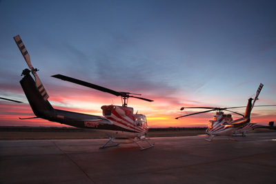 heliocopters at sunset