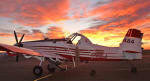 Sunset behind Aero Tech plane